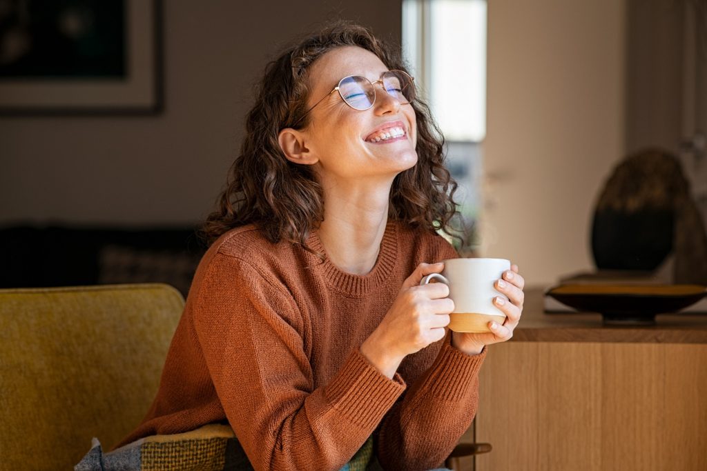 a girl enjoying her coffee