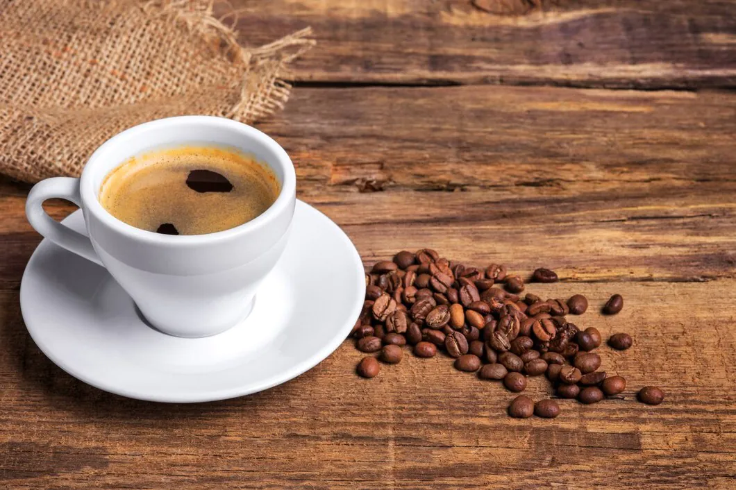 coffee bean and a cup of coffee